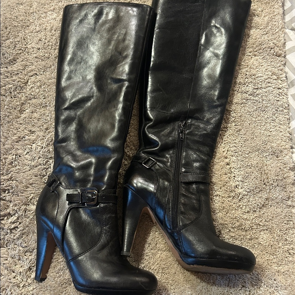 Aldo black leather boots size 38.5 or 8. Worn just twice. Perfect Condition.